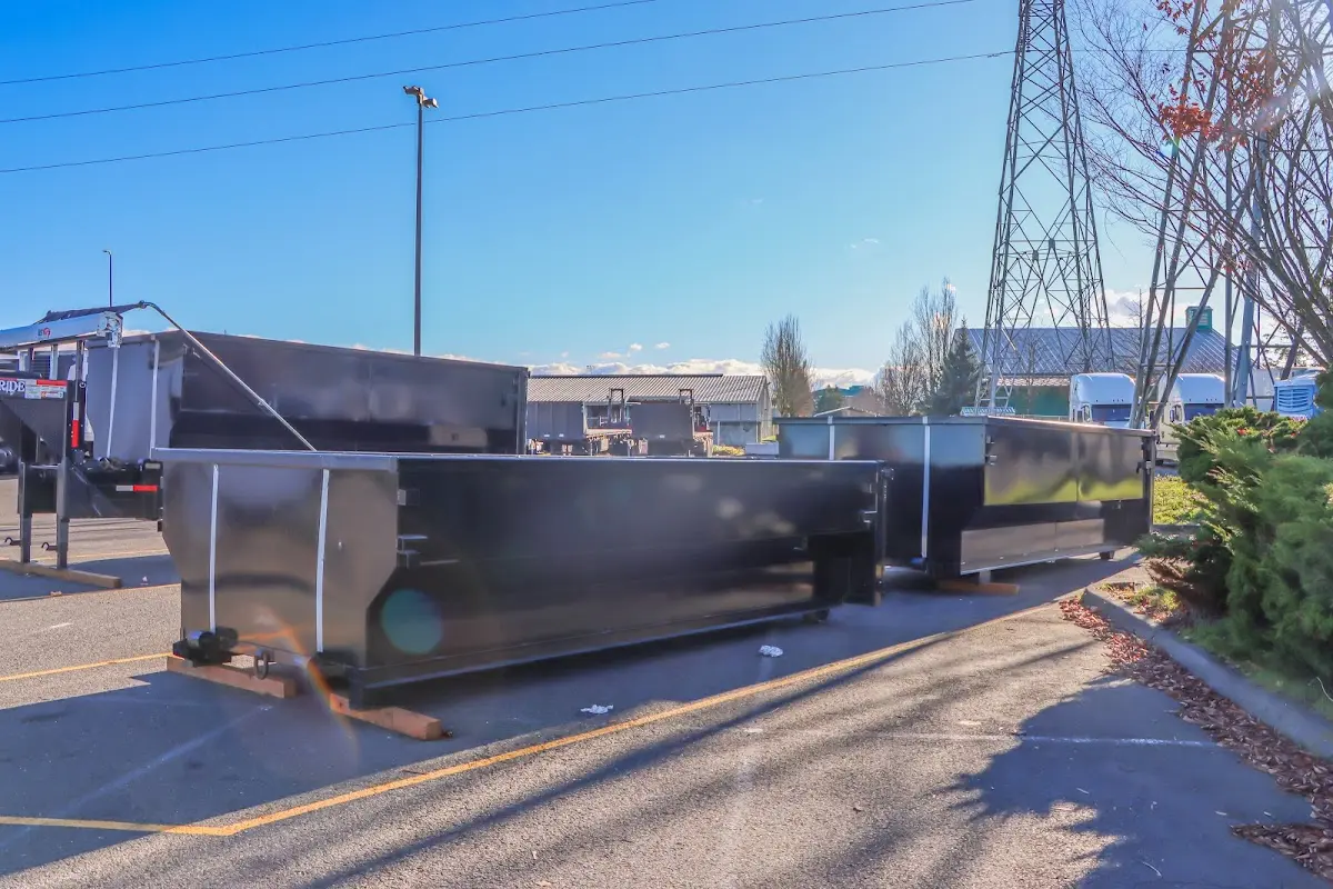 Roll-off dumpster ready for waste disposal at job site for 12 Yard Dumpster Rental in Hope